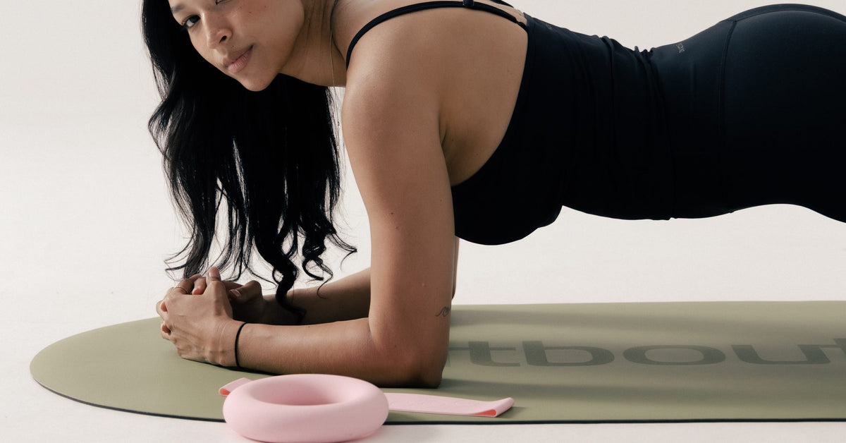 Plank with a Pilates ring on a FitBoutique mat
